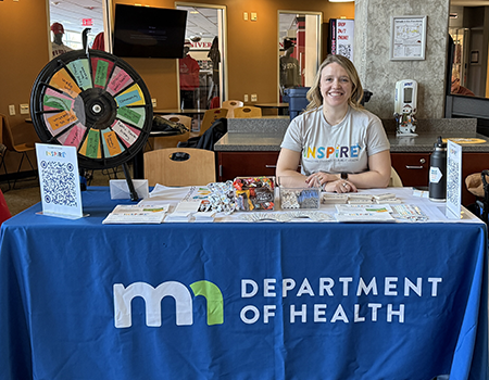 INSPIRE staff at exhibit table