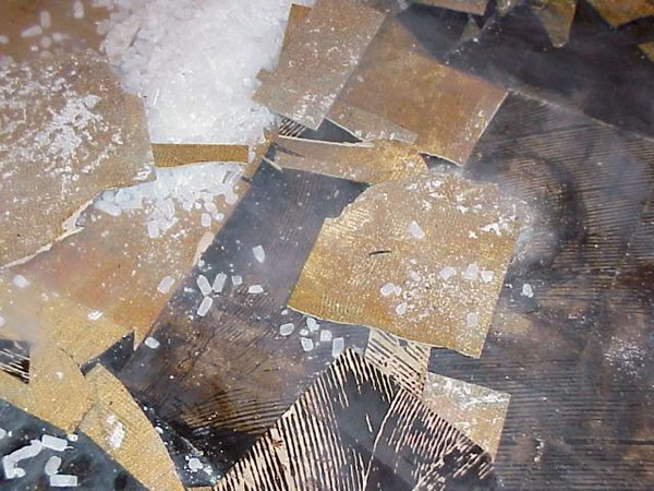 Floor tile damaged by dry ice