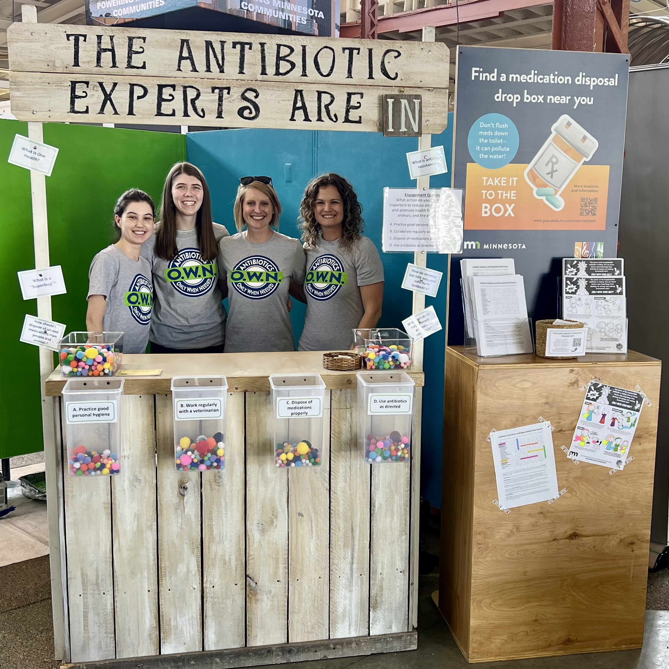 volunteers at the Minnesota One Health Stewardship Collaborative state fair booth